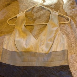 A white, silver and grey elegant dress.